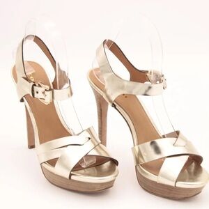 COACH metallic gold leather heels